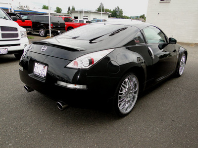 nissan 350z 2004 black coupe touring gasoline 6 cylinders rear wheel drive 6 speed manual 98371