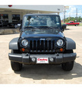 jeep wrangler unlimited 2012 black suv sport gasoline 6 cylinders 4 wheel drive automatic with overdrive 77657