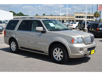 lincoln navigator 2004 beige suv luxury gasoline 8 cylinders 4 wheel drive automatic with overdrive 77043