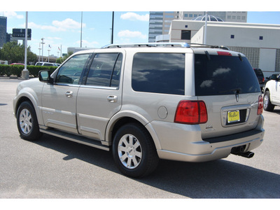 lincoln navigator 2004 beige suv luxury gasoline 8 cylinders 4 wheel drive automatic with overdrive 77043