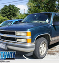 chevrolet tahoe 1995 green suv gasoline 8 cylinders rear wheel drive 4 speed automatic 75062