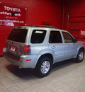 mercury mariner 2006 lt  green suv premier gasoline 6 cylinders front wheel drive automatic with overdrive 76116