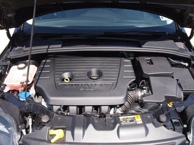 ford focus 2012 black sedan titanium flex fuel 4 cylinders front wheel drive automatic 76011