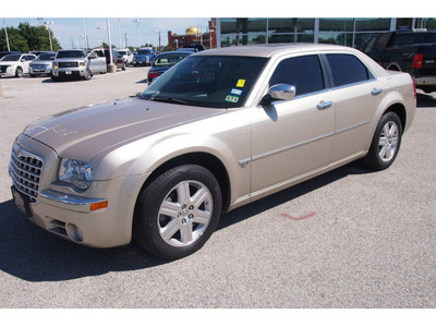 chrysler 300 2006 gold sedan c gasoline 8 cylinders all whee drive automatic 77074