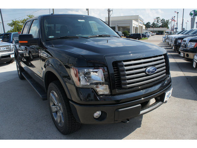 ford f 150 2012 black gasoline 6 cylinders 4 wheel drive automatic 77338