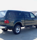 ford f 150 2001 dk  green lariat gasoline 8 cylinders 4 wheel drive automatic 62708