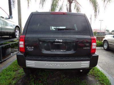 jeep patriot 2008 black suv limited gasoline 4 cylinders 4 wheel drive automatic 33157