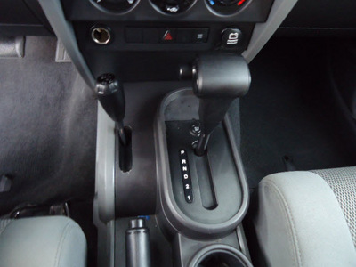 jeep wrangler 2007 black suv sahara gasoline 6 cylinders 4 wheel drive automatic 33157