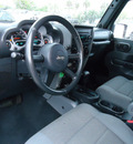 jeep wrangler 2007 black suv sahara gasoline 6 cylinders 4 wheel drive automatic 33157