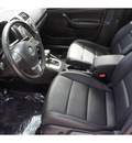 volkswagen jetta 2010 black sedan tdi diesel 4 cylinders front wheel drive automatic 78539
