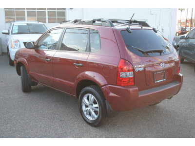 hyundai tucson 2009 dk  red suv gasoline 4 cylinders front wheel drive automatic 78501