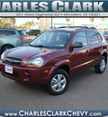 hyundai tucson 2009 dk  red suv gasoline 4 cylinders front wheel drive automatic 78501