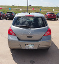 nissan versa 2010 dk  gray hatchback 1 8 s gasoline 4 cylinders front wheel drive automatic 76116