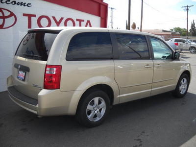 dodge grand caravan 2010 gold van se gasoline 6 cylinders front wheel drive automatic 79925