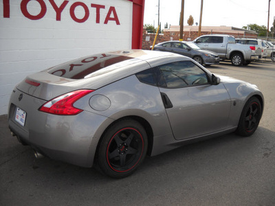 nissan 370z 2009 gray coupe gasoline 6 cylinders rear wheel drive standard 79925