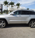 jeep grand cherokee 2012 silver suv overland gasoline 8 cylinders 2 wheel drive automatic 33157