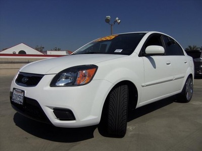 kia rio 2011 white sedan gasoline 4 cylinders front wheel drive manual 90241