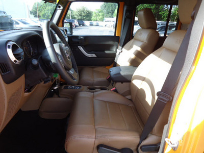 jeep wrangler 2012 orange suv unlimited sahara gasoline 6 cylinders 4 wheel drive automatic 33157