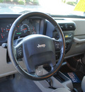 jeep wrangler 2004 beige suv sahara gasoline 6 cylinders 4 wheel drive automatic 27616
