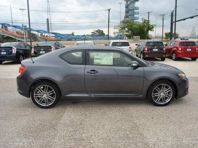 scion tc 2013 gray coupe gasoline 4 cylinders front wheel drive 6 speed manual 76011