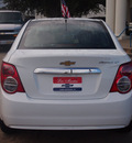 chevrolet sonic 2012 white sedan lt gasoline 4 cylinders front wheel drive shiftable automatic 77566