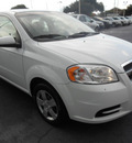chevrolet aveo 2011 white sedan lt gasoline 4 cylinders front wheel drive automatic with overdrive 34474