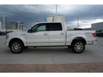 ford f 150 2011 white platinum gasoline 8 cylinders 4 wheel drive automatic 77043