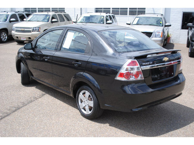 chevrolet aveo 2009 black sedan lt gasoline 4 cylinders front wheel drive automatic 78501