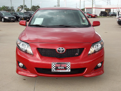 toyota corolla 2010 red sedan s gasoline 4 cylinders front wheel drive automatic with overdrive 77469