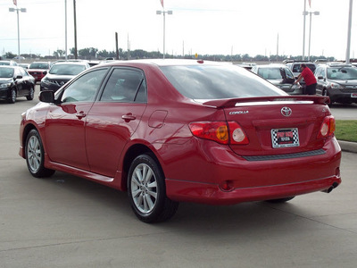 toyota corolla 2010 red sedan s gasoline 4 cylinders front wheel drive automatic with overdrive 77469