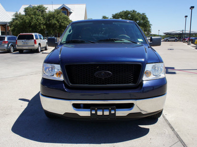 ford f 150 2006 blue xlt gasoline 8 cylinders rear wheel drive automatic with overdrive 76087
