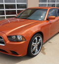 dodge charger 2011 orange sedan se gasoline 6 cylinders rear wheel drive automatic 77656