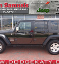 jeep wrangler unlimited 2010 black suv sport gasoline 6 cylinders 4 wheel drive automatic with overdrive 77450