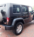 jeep wrangler unlimited 2010 black suv sport gasoline 6 cylinders 4 wheel drive automatic with overdrive 77450