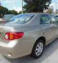 toyota corolla 2010 tan sedan le gasoline 4 cylinders front wheel drive automatic 32783