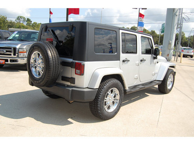 jeep wrangler unlimited 2007 silver suv sahara gasoline 6 cylinders rear wheel drive 6 speed manual 77706