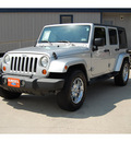 jeep wrangler unlimited 2007 silver suv sahara gasoline 6 cylinders rear wheel drive 6 speed manual 77706