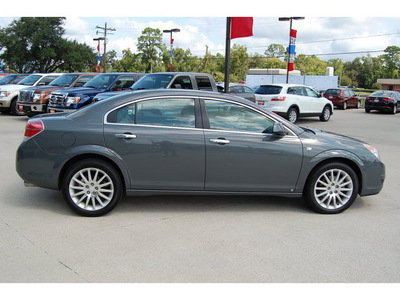 saturn aura 2009 gray sedan xr v6 gasoline 6 cylinders front wheel drive automatic with overdrive 77706