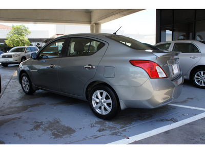 nissan versa 2012 silver sedan 1 6 s gasoline 4 cylinders front wheel drive automatic 77477