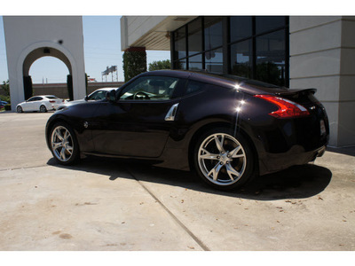 nissan 370z 2012 dk  red coupe touring gasoline 6 cylinders rear wheel drive automatic 77477