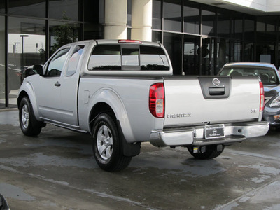 nissan frontier 2010 silver se v6 gasoline 6 cylinders 2 wheel drive automatic with overdrive 77477