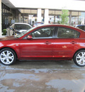 mazda mazda3 2009 dk  red sedan i touring value gasoline 4 cylinders front wheel drive shiftable automatic 77477