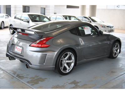 nissan 370z 2011 silver coupe nismo gasoline 6 cylinders rear wheel drive 6 speed manual 77477
