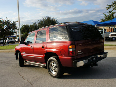 chevrolet tahoe 2002 red suv lt flex fuel 8 cylinders rear wheel drive 4 speed automatic 76210