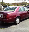 cadillac deville 2000 red sedan gasoline 8 cylinders front wheel drive automatic 77565