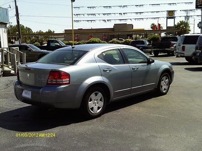 dodge avenger 2009 silver sedan sxt gasoline 4 cylinders front wheel drive automatic 77565