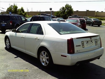 cadillac sts 2005 white sedan gasoline 8 cylinders automatic 77565