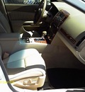 cadillac sts 2005 white sedan gasoline 8 cylinders automatic 77565