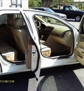 cadillac sts 2005 white sedan gasoline 8 cylinders automatic 77565