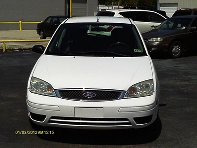 ford focus 2007 white hatchback zx5 se gasoline 4 cylinders front wheel drive automatic 77565